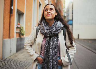 Image showing Travel, walking and woman in the city street for adventure, thinking and exploring on holiday in France. Smile, peace and girl on a walk in the road during a vacation to relax while traveling