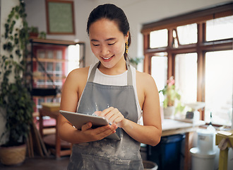 Image showing Business owner, Asian woman and tablet for connection, digital marketing or artist in studio. Female creative, lady or entrepreneur with online planning, ceramic store or smile for project or startup