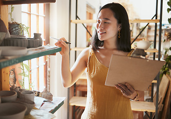 Image showing Pottery stock check, business woman and clipboard data of a entrepreneur with store information. Happy, counting and startup worker busy working on a ceramic inventory search for accounting audit