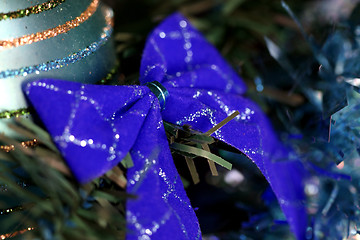 Image showing Christmas ornaments on tree.