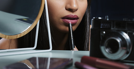 Image showing Makeup, beauty and woman with lipstick and camera for social media, blogging and cosmetology vlog. Fashion model, art deco and influencer with designer products, glamour and apply cosmetics on face