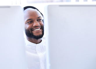 Image showing Business, black man and call center for customer support, telemarketing and consulting. African American male employee, consultant and agent with smile, computer and client service for advice or help