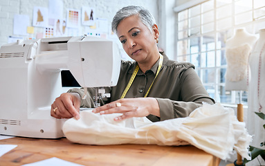 Image showing Tailor, senior woman and sewing machine for clothes fabric, luxury apparel or creative design in studio workshop atelier. Startup small business designer, service and sewer working on fashion outfit