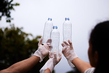 Image showing Plastic recycling, sky bottle and volunteer cleaning garbage, pollution or waste product for environment support. Community help, NGO charity and eco friendly people helping with nature park clean up