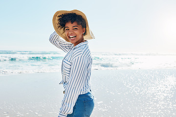 Image showing Travel, summer and portrait of black woman at beach on holiday, vacation and weekend by ocean. Happy lifestyle, nature and excited girl laugh, relaxing and enjoying adventure, freedom and fun by sea