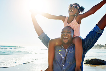 Image showing Love, beach and girl on shoulder of father enjoy summer holiday, vacation and freedom on weekend. Black family, travel and happy dad and child smile on adventure for bonding, relax and fun by ocean