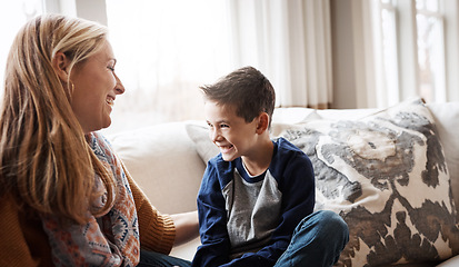 Image showing Family, children and love with a mother and son sitting on the sofa in the living room of their home together. Kids, relax and fun with a woman and boy child spending time or bonding in the house