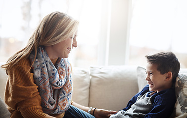 Image showing Love, mother and son on sofa, playing and bonding on weekend, loving and relax in living room. Mama, boy and male child connecting, playful and smile on break, motherhood and kid on couch in lounge