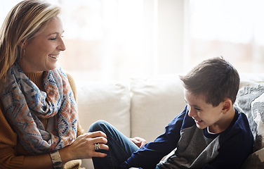 Image showing Love, mother and son on couch, playing and bonding on weekend, loving and tickling in living room. Mama, family and male child with mom, playful and cheerful on break, laughing together and happiness