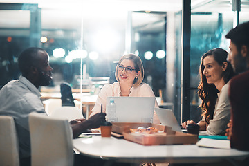 Image showing Teamwork, late night and business people at workshop table with ideas, laptop and pizza at creative agency. Proposal, overtime and diversity, dinner for men and women brainstorming at startup project