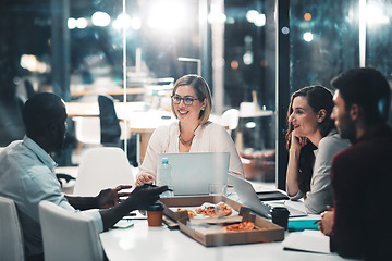 Image showing Workshop, late night and marketing team in discussion at meeting with laptop and food at startup. Teamwork, overtime and diversity, business people brainstorming project at creative marketing agency.