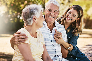 Image showing Family, park and woman with elderly parents outdoors, bonding and having fun. Love, support and female with grandma and grandfather in retirement, talking and enjoying quality time together in nature