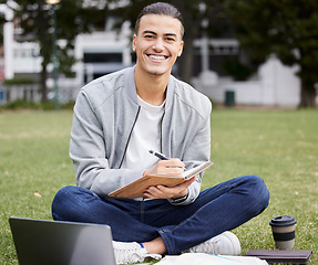 Image showing Study, laptop and student portrait in park writing at university, college or campus for research, planning schedule and scholarship. Happy man relax and learning with technology and notebook for exam