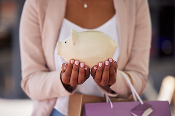 Image showing Piggy bank, shopping and hands in savings account, finance and credit loan with banking, inflation or investment wealth, profit or growth. Fashion woman outdoor with shopping bag budget and investing