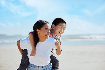 Image showing Mom, beach piggyback and asian kid with interracial family bonding, nature and outdoor vacation in sunshine. Happy family, ride and black woman for adoption, love and adventure by ocean on holiday
