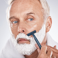 Image showing Man face, shaving foam or grooming in self care maintenance or beauty aesthetic on studio background. Zoom, mature model or hair removal cream in facial cleaning, growth control or hygiene skincare