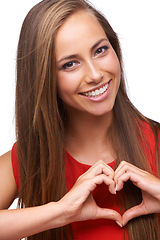 Image showing Woman, happy and heart shape portrait or emoji for love sign, happiness and support in white background. Model, face and smile for self care peace, loving hand gesture or symbol in isolated studio