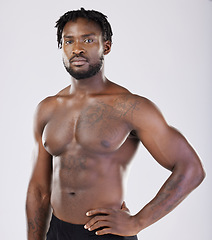 Image showing Black man, fitness and portrait of sports person in studio for strong body, muscle and power. Health and wellness of a sexy male bodybuilder model with growth after exercise, workout and training