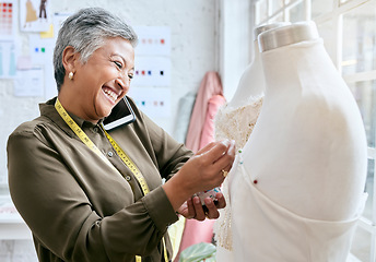 Image showing Fashion, designer and phone call of woman with mannequin in workshop. Startup, smartphone and happy elderly female seamstress or tailor talking or networking with contact while sewing dress on dummy