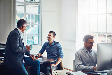 Image showing Office building, meeting and business people talking at desk for planning, company success and goals. Corporate workplace, teamwork and employees sitting at table, in discussion and coworking on idea