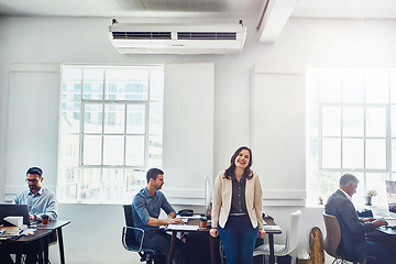 Image showing Woman, office portrait and leader of business people, confident smile and happiness for success. Marketing manager, leadership and happy for office team, staff commitment and company vision by desk