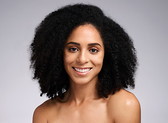 Image showing Beauty, portrait and skincare with a model black woman in studio on a gray background for natural skin cosmetics. Face, hair and afro with an attractive young female posing to promote skin treatment