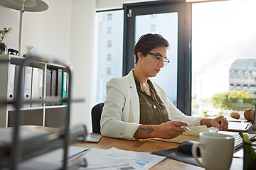 Image showing Writing, notebook and business woman planning schedule, workflow ideas and company administration at her desk. Paperwork, notes and corporate secretary, office worker or employee with career strategy