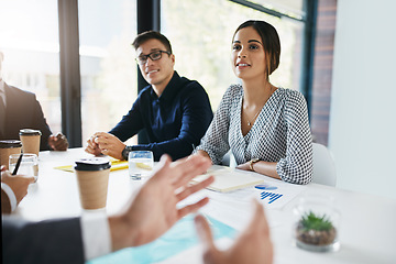 Image showing Business people, meeting and discussion for team planning, analysis or brainstorming ideas at the office. Group of employee workers in conversation, teamwork or collaboration for corporate goals