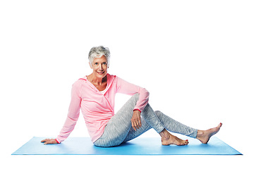 Image showing Yoga, portrait and senior woman in studio isolated on a white background. Zen chakra, pilates fitness and retired, elderly and happy female model sitting on mat and training for health and wellness.