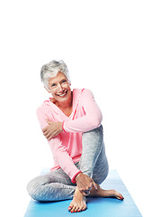 Image showing Senior, yoga and portrait of woman in studio isolated on a white background. Zen chakra, pilates fitness and retired happy female from Canada sitting on mat after training and stretching for wellness