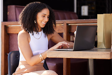 Image showing Woman, cafe and laptop with smile, shopping and ecommerce on internet sale, discount or deal. Black woman, happy and coffee shop with online shopping, computer and web to search, clothes and fashion