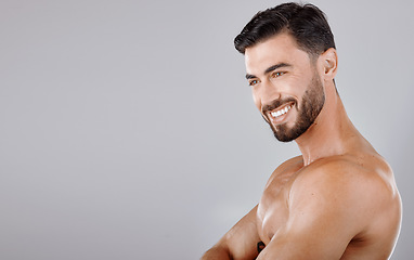 Image showing Man, face and smile with beauty and skincare, muscle and glow with cosmetic skin treatment against studio background. Grooming, hygiene and body cleaning mockup with natural cosmetics and wellness