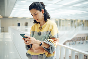 Image showing Woman typing, smartphone and connection for social media, conversation and search internet. Canada, female student or girl with cellphone, online reading and scroll for website, email or casual style