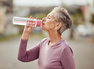 Image showing Fitness, runner or senior woman drinking water with sports goals resting or relaxing on break. Healthy, tired or thirsty elderly lady drinks natural liquid in cardio workout, training or exercise