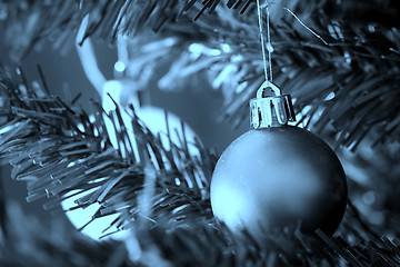 Image showing Christmas ornaments on tree.