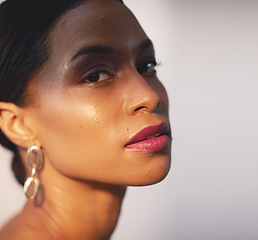 Image showing Portrait, beauty and skincare with a model black woman in studio on a gray background for natural care. Face, cosmetics and wellness with an attractive young female posing to promote a luxury product