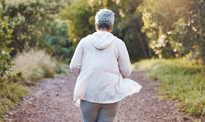 Image showing Fitness, exercise and senior woman on nature trail for running, cardio and a workout for health and wellness outdoor. Elderly female in a forest to run for a healthy lifestyle, body and energy