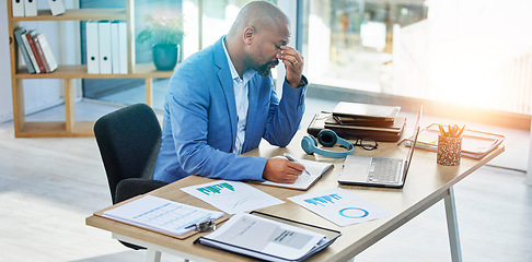 Image showing Burnout, laptop or corporate black man with headache in office with tax finance or company audit stress with lens flare. Sad, documents or employee with mental health, depression or financial anxiety