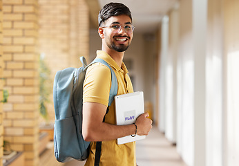 Image showing College student portrait, happy man and walking at university with a tablet and backpack to study and learn. Gen z male happy about education, learning and future after studying at school building