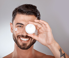 Image showing Beauty, skincare and portrait of man with cream on gray background for wellness, spa treatment and hygiene. Cosmetics, grooming and face of male model with lotion, self care and facial treatment