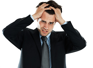 Image showing Face, stress and burnout business man in studio isolated on a white background. Anxiety, depression and portrait of angry male employee pulling his hair out after bad news, deal or financial crisis
