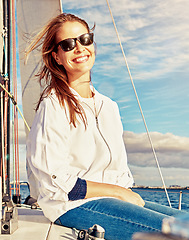 Image showing Mature, happy woman or yacht sunglasses on ocean, sea or water lake for relax holiday, vacation or Greece summer Smile, tourist or luxury sailing boat for retirement freedom or nature travel location