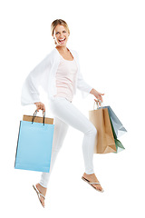 Image showing Happy woman jump with bag from shopping, fashion and retail, customer in air isolated on white background. Smile in portrait, luxury designer brand and clothes, gift and discount sale with freedom