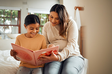 Image showing Pregnant mother reading to kid for fun learning, language and home development help, support and bonding. Family, Indian people or mom and child, storytelling book for creative education or teaching