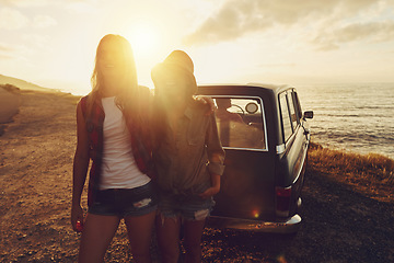 Image showing Sunset lens flare with women, car and road trip, travel with friends at beach, outdoor with nature and sea holiday. Transportation, freedom and sunshine on summer vacation, happiness with adventure