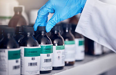 Image showing Hand, labratory and medical vaccine with a nurse working in a hospital or clinic for treatment or cure. Healthcare, insurance and bottle with a female medicine professional at work during corona