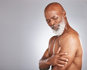 Image showing Arm pain, injury and senior black man with muscle inflammation, body accident and broken bone on studio background. Healthcare, anatomy and African elderly model with painful biceps and mockup space