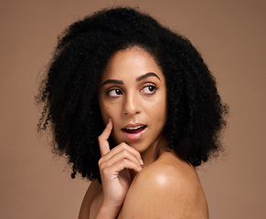 Image showing Hair, beauty and black woman with hair care and surprise, wow and skincare with microblading, healthy skin and glow. Natural curly hair, hand and cosmetic care with facial against studio background