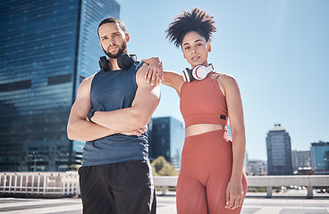 Image showing Couple, city portrait and fitness with headphones for music, motivation or outdoor urban workout. Exercise team, black couple and support for health, wellness or training for summer in Cape Town