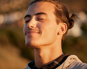 Image showing Man, face and smile breathing fresh air for spiritual wellness, health or satisfaction in the nature outdoors. Happy male, person or guy smiling in happiness for freedom, oxygen or calm peace outside